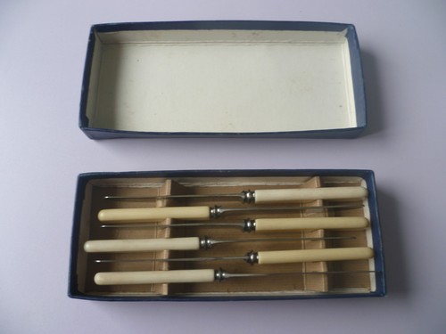 Six vintage but unused - but, faux