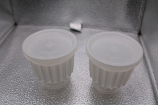 pair of vintage tupperware