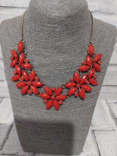 Red and gold tone statement