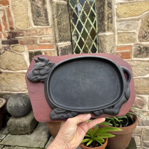 Cast iron cow shaped sizzling - shaped,