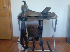 Reluctant Sale of a Western Saddle.   Dark brown leather with silver trim. 