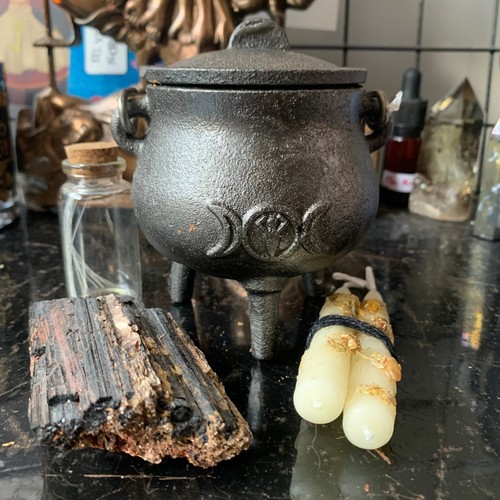 Cast iron cauldron with - with, triple