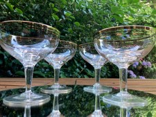 4  vintage Champagne Saucers