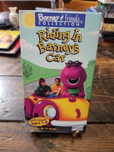 Barney riding barneys - -, car