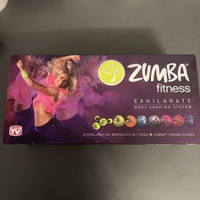 Zumba Fitness Exhilarate Body Shaping System 7 DVDs + 2 Toning Sticks NEW