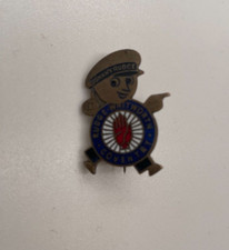 Vintage enamel brass pin badge