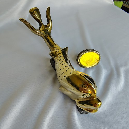 Brass dolphin door knocker