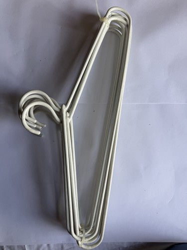 White metal wire coat hangers - white,