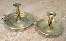 2 well worn pressed brass