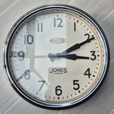 Jones London No Electricity 26cm Wall Clock Retro Chrome Battery-operated