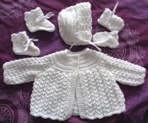 Hand knitted white girls - hand,