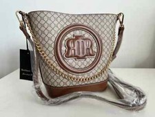 RIVER ISLAND tan monogram