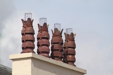 Photo A3 four matching chimney pots Tiverton/SS9512 red louvred clay ch c2011