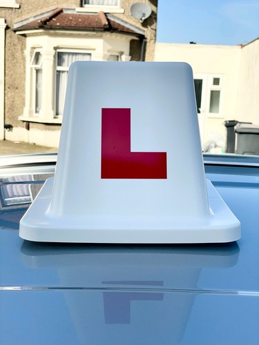 Learner driver driving - learner, school