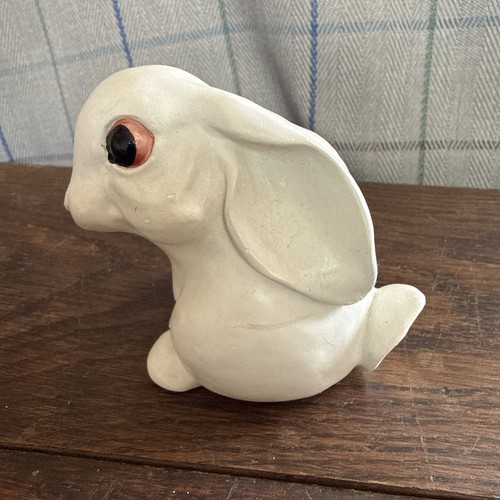 White hand painted sitting