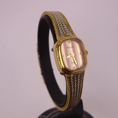 Bulova tone gold plated - bulova,