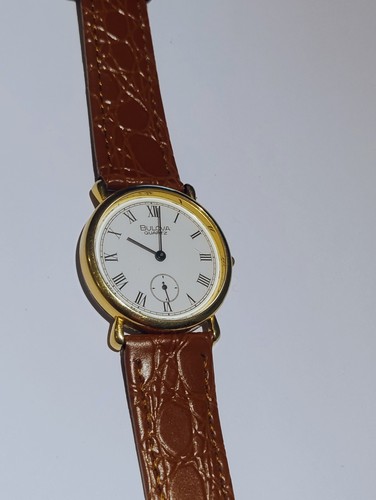 Bulova gold tone - quartz, mens