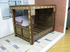 Tudor Rose Bed in Dark Oak