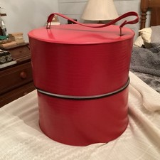 Vintage hat/wig box red faux leather approximately 14” x 14” including Wig