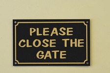 PLEASE CLOSE THE GATE sign or