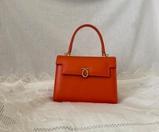 Launer Judi bag, new condition never used. Flap linning fade slightly  