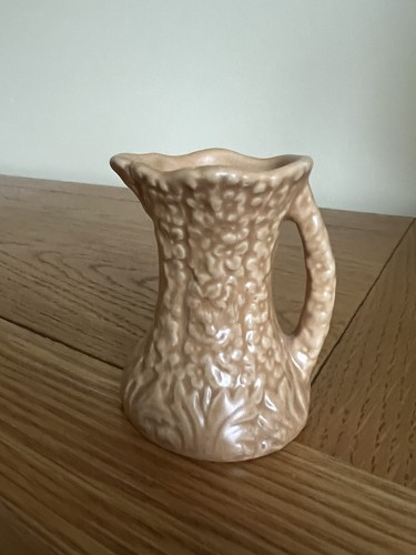 Miniature pottery jug falcon - jug,