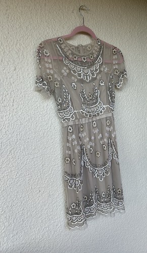Needle and thread embellished - and,