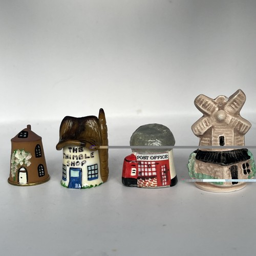 Four thimble buildings oast - four,