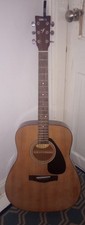 Yamaha F310 Acoustic Guitar with capo included