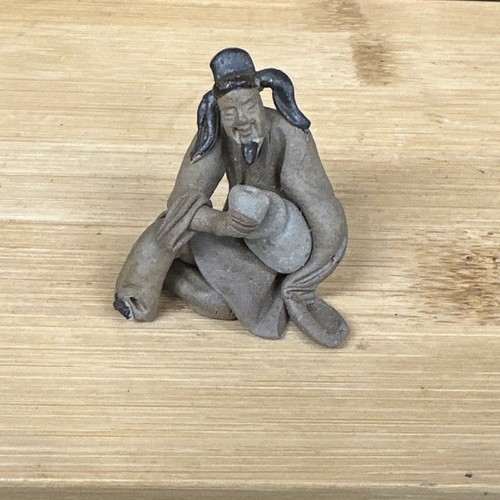 Unglazed chinese mudman - unglazed,
