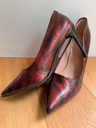 Red snakeskin style heels