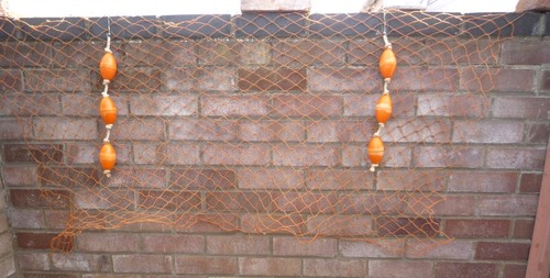 Three fishing floats on a - 2, x