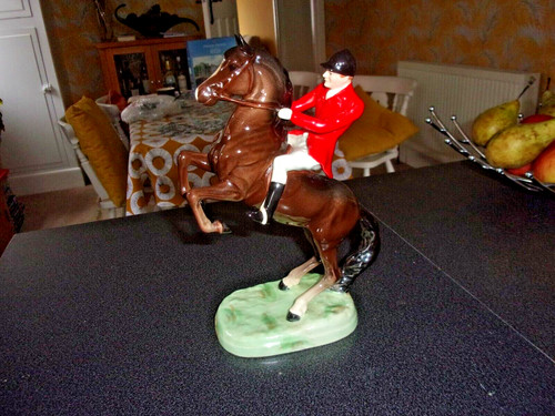 Beswick huntsman seated - huntsman,