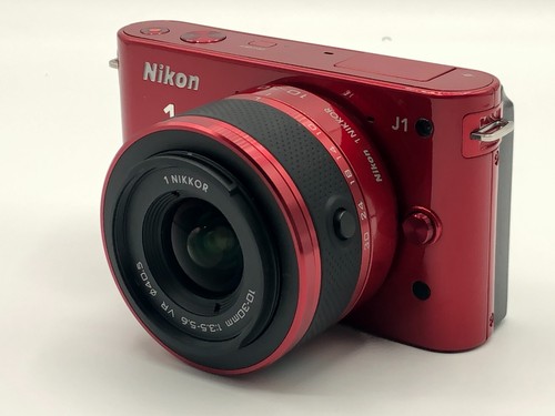Nikon red mirrorless - j1,