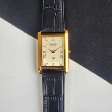 vintage Seiko Slim Tank Quartz Men Gold Dial Black Strap Dress Watch UK55