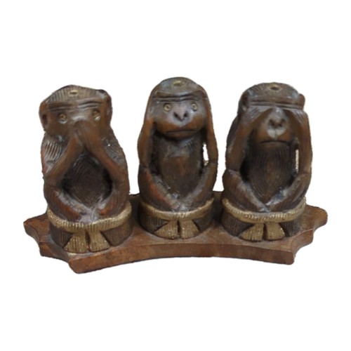 Carved wood three - three, evils