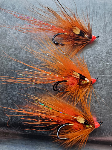 The orange reaper salmon fly - orange,