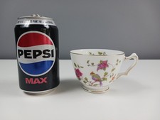 A Single Crown Staffordshire Bone China Cup With Bird of Paradise Design