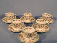 MINTON HADDON HALL PATTERN,  SET OF SIX DEMITASSE CUPS AND SAUCERS