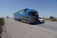 Truck Photo Volvo FH16 Tarpaulin Tractor Trailer Kyrgyzstan blue EURO LEASING HEPMER #w2ew