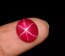 A pair of star ruby cabochons