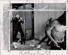 1970 Press Photo Guard sprays