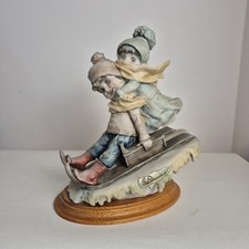 Giuseppe Armani Figurine Boy and Girl Sledging  "Winter Fun" 1982 Capodimonte 