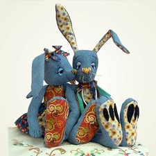 Raggedy rabbit soft toy bunny