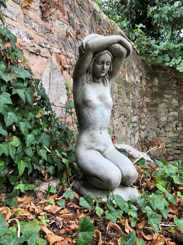 Naked bathing lady stone
