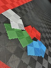 MODULAR INTERLOCKING GARAGE FLOOR TILES
