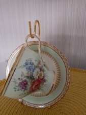 A Pretty Cup and Saucer Fine