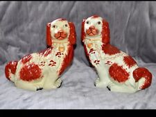 Pair Staffordshire russet & white curly tailed spaniels
