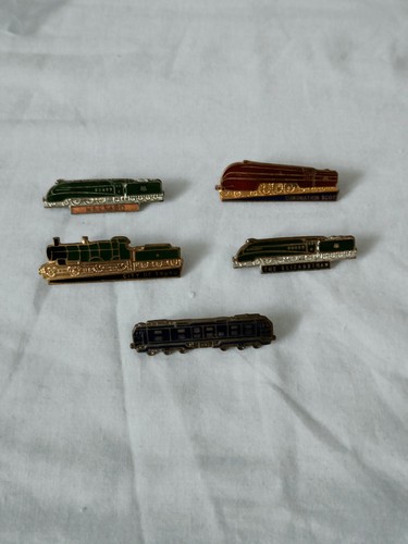 Five vintage lapel badges - five,