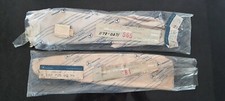 Genuine Mercedes SL R107 door chromes A1077250194 and A1077250294